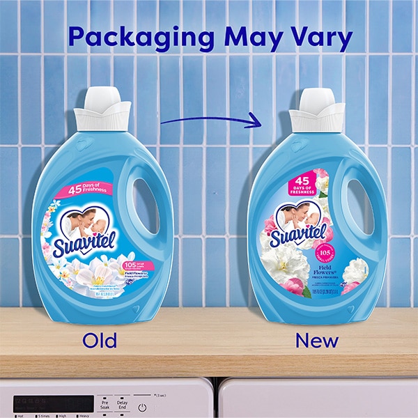 Comparison of old and new Suavitel Field Flowers Fabric Conditioner packaging, showing both blue bottles with '45 days of freshness' and '105 small loads' labels, on a laundry room surface with a blue tile background
